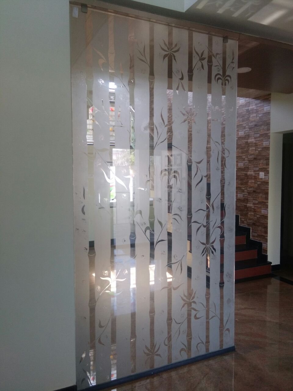 Etched bamboo design glass partition