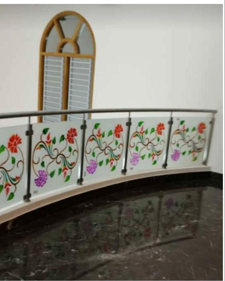 Printed floral glass on a curved railing